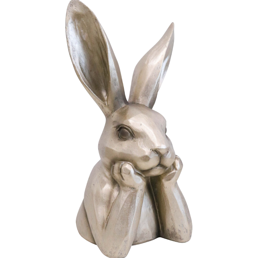 Hare Contemplating Small decorative sculpture in a soft champagne finish with paws resting beneath its chin.