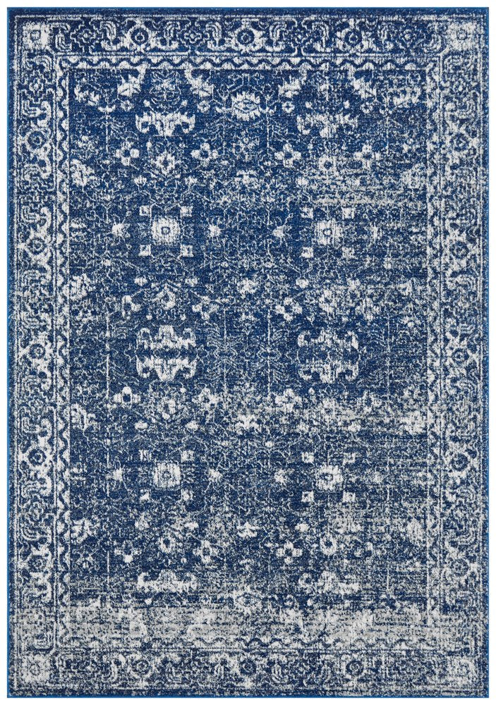 Harley Navy Rug with distressed vintage Persian pattern in rich navy blue and ivory tones.