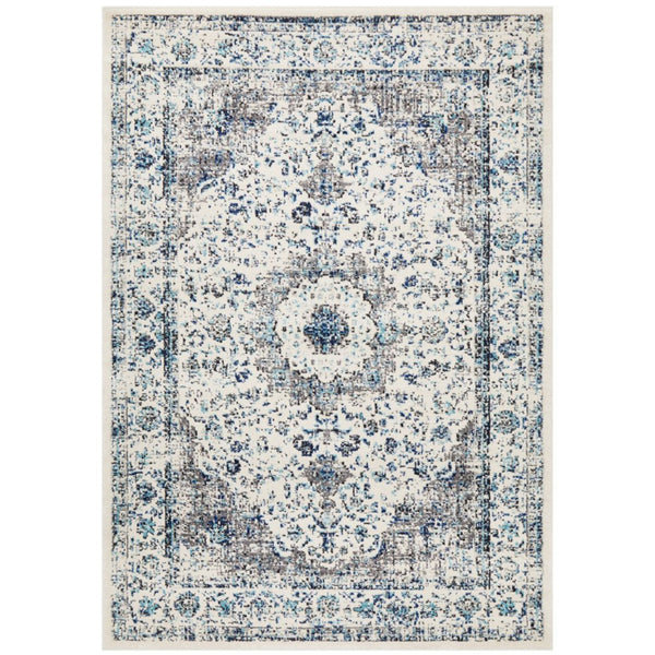 Harley White Rug featuring a distressed floral design in ivory, charcoal, grey, and ocean blue tones