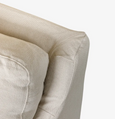 Close-up fabric detail of the Hastings Armchair showing textured natural linen blend upholstery