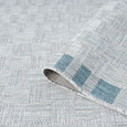 Haven Blue Outdoor Rug showing flexible polypropylene flat-weave construction and blue detailing