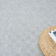 Close-up of basket-weave inspired texture on the Haven Blue Outdoor Rug