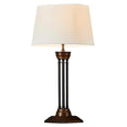 Hudson Table Lamp Base Bronze styled with a Medium Dark Natural Linen Drum Lamp Shade, featuring an Art Deco inspired bronze base and warm linen shade for timeless living room or bedroom lighting.