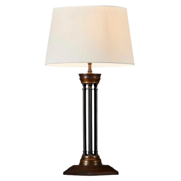 Hudson Table Lamp Base Bronze styled with a Medium Dark Natural Linen Drum Lamp Shade, featuring an Art Deco inspired bronze base and warm linen shade for timeless living room or bedroom lighting.