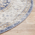 Detailed close-up of the Hunter Ocean Round Rug highlighting the vintage-inspired blue and ivory pattern.
