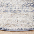 Close-up of the Hunter Ocean Round Rug border showing the traditional medallion design and bound edge finish.