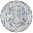 Hunter Ocean round rug featuring a distressed traditional medallion design in ocean blue, ivory and warm sand tones.