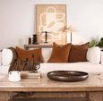 Huntley leather and brass table lamp with tapered linen shade styled on a bedside table
