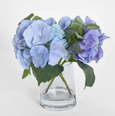 Side view of the Hydrangea Bloom in Glass Vase Lavender showcasing realistic faux hydrangea blooms in soft lavender and powder blue tones.