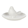 Side view of white ceramic bird sculpture dish with soft minimalist coastal design and decorative trinket tray.