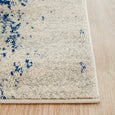 Close-up of Isla White and Navy Runner showing distressed pattern and bound edge