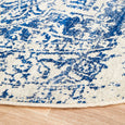 Curved edge of Isla White Navy Round Rug showing navy and white vintage pattern