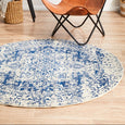 Isla White Navy Round Rug creating a blue and white focal point in a relaxed interior