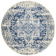 Isla White Navy Round Rug with distressed navy medallion pattern on warm white