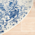 Isla White Navy Round Rug showing distressed navy pattern and bound curved edge