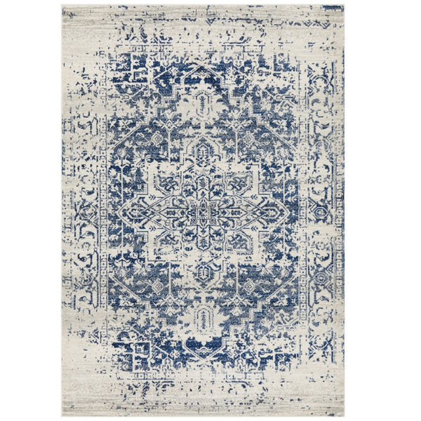 Isla White Navy Rug featuring distressed medallion pattern in navy blue and ivory tones