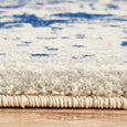 Side profile of Isla White Navy Rug showing plush low-pile polypropylene texture