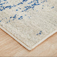 Close-up of Isla White and Navy Runner showing distressed pattern and bound edge