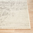 Corner detail of the Isla White Silver Rug showing the soft distressed texture and neutral palette