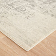Corner detail of the Isla White Silver Rug showing the soft distressed texture and neutral palette
