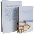 Island Escape Decorative Book Box Set of 2 shown open to reveal concealed storage compartments inside the coordinating coastal blue book-shaped boxes.