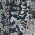 Soft textured surface detail of the Keira Grey Runner in layered grey and muted blue tones