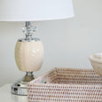 Elegant Lauren table lamp with polished metallic base and crystal detail
