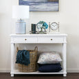 coastal console styling with blue and white lamp artwork and decorative accents