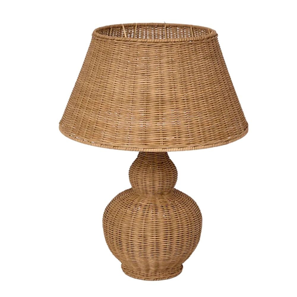 Long Island rattan table lamp styled in a coastal Hamptons living room with warm ambient lighting