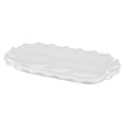 White porcelain oval platter with elegant scalloped edges for serving and coastal table styling.