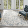Marlowe Porcelain Rug styled in a light Hamptons living room with soft blue seating and pale timber flooring.