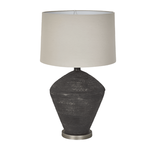 Meridien black ceramic table lamp with natural linen shade styled in a contemporary living space