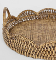 Close-up of the Mesa Scallop Rattan Tray highlighting the intricate handwoven rattan weave and decorative scalloped edge.