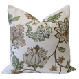 white cushion with olive botanical embroidery floral design front view