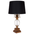 antique gold table lamp with glass pineapple base and black shade angled view