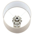 top view of linen drum shade and bulb fitting on table lamp