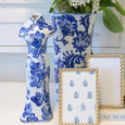 Monterey Bay Tapered Vase 30cm styled with white hydrangeas alongside blue and white ceramics and decorative photo frames in a Hamptons-inspired interior.