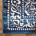 Close-up detail of the Monterey Navy Rug showing the distressed navy border and soft textured