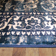 Edge detail of the Monterey Navy Rug highlighting the finished border and soft pile construction