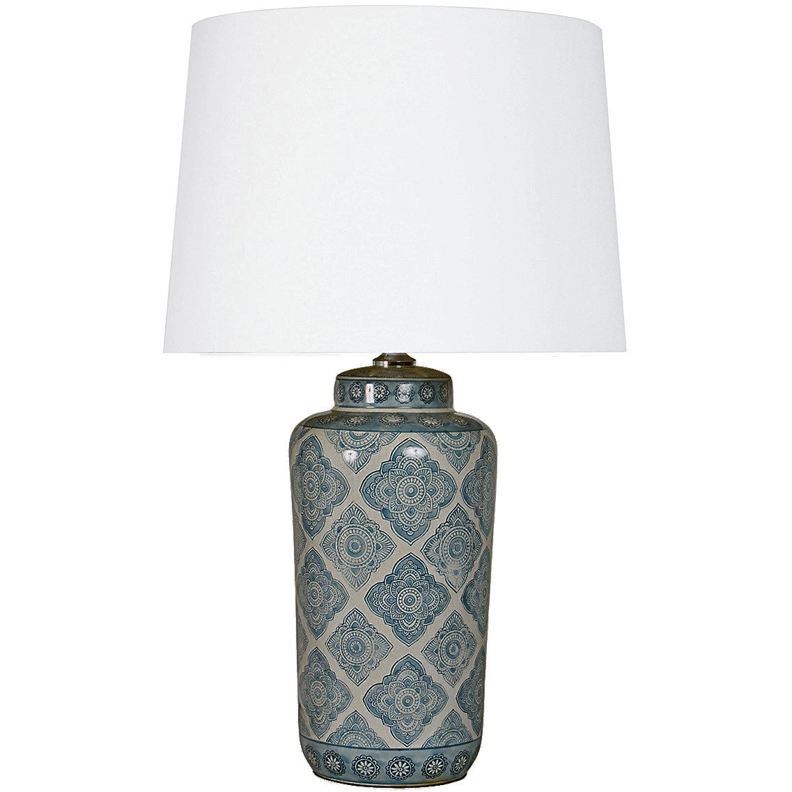 Motif ceramic table lamp with hand painted geometric base and white empire shade styled in a contemporary living room
