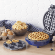 navy stripe tea towel styled in kitchen with waffle maker and breakfast setting