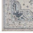Corner detail of Newport Blue Rug showing textured distressed medallion pattern