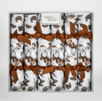 otono magnolia crackers set of six with brown and white floral design and ribbon detail, elegant table styling