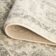 Folded detail of the Parker White Rug showing the flexible backing and soft textured construction