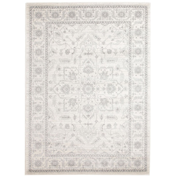 Parker White Rug featuring a soft distressed floral pattern in ivory and grey tones
