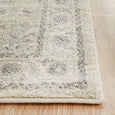 Close-up of the Parker Winter White Runner Rug showing the soft cream pile and distressed traditional border.