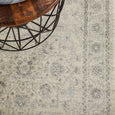 Overhead detail of the Parker Winter White Runner Rug with a distressed cream and grey traditional design.