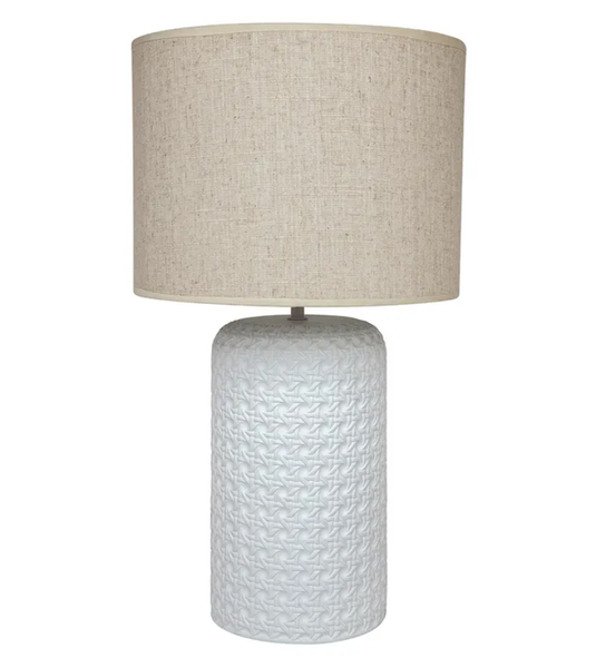 Patronga table lamp featuring a woven rattan-look ceramic base with chalky matte finish and natural linen-look drum shade.