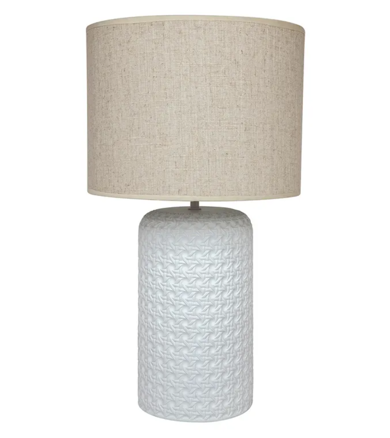 Patronga table lamp featuring a woven rattan-look ceramic base with chalky matte finish and natural linen-look drum shade.