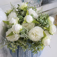 Peony Fittonia Mix Bouquet White styled in a textured blue vase with lush white blooms and greenery